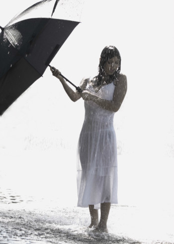 Anissa Rachelle Flores holding an umbrella