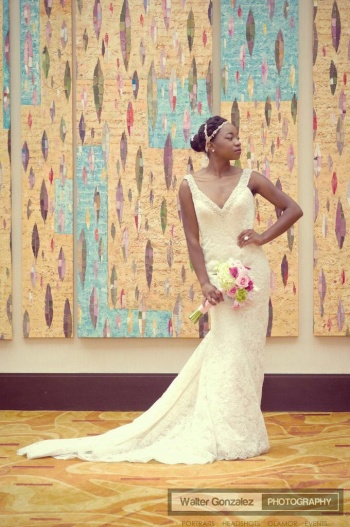 Camara-Elecha modeling a cream colored bridal dress