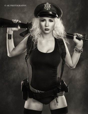 Cheyanna Lavon Zubas holding an assault rifle