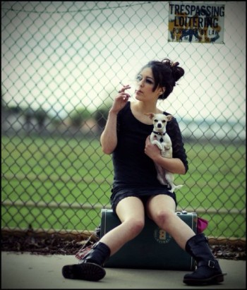 Gabriella Tanner holding a chihuahua dog