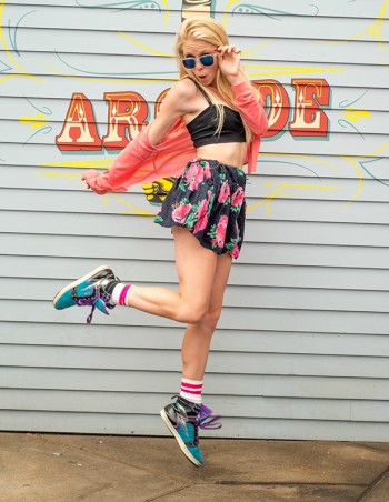 Hailee Alexis Hussion wearing sneakers and miniskirt