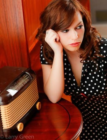Hali Slone listening to an old radio