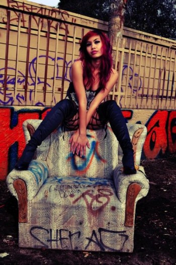 Isabelle Diep on a grafitti couch