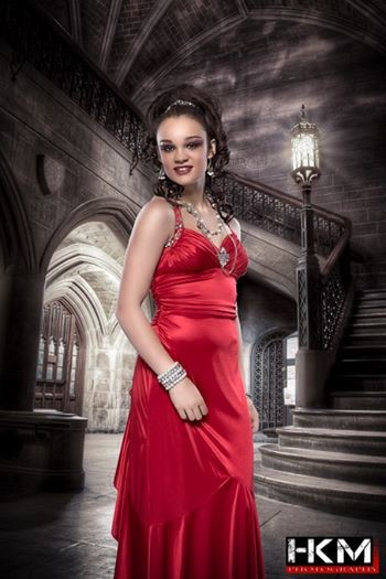 Kasity Koehn modeling a red gown