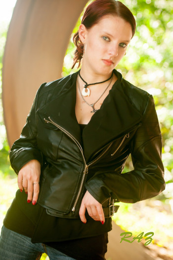 Lady Faide modeling a leather jacket