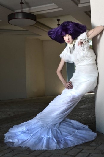 Lauren Poole modeling a white dress