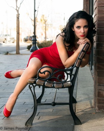 Libertad Green - Modeling red dress on a bench
