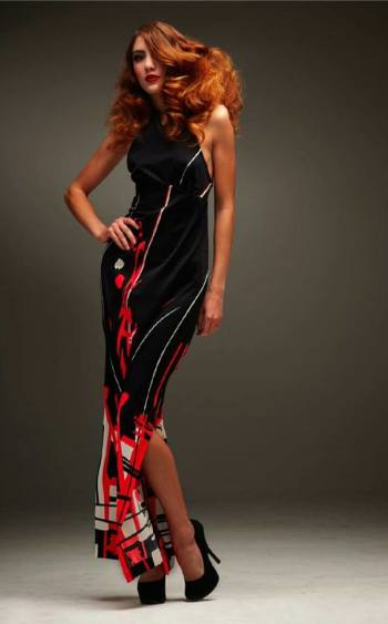 Logan Westbrook modeling a long black red dress