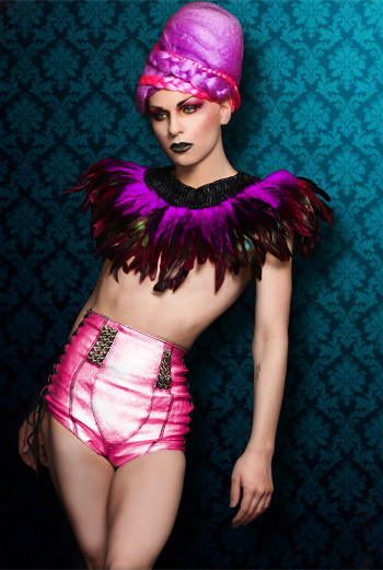 Plastic Martyr in a very flashy feather outfit