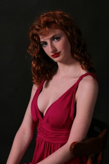 Rose Lidikay wearing a red dress