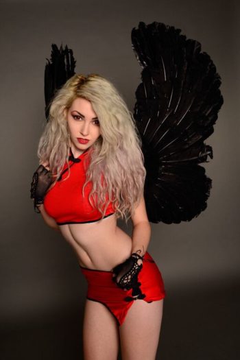 Genevieve Burnesse with black wings